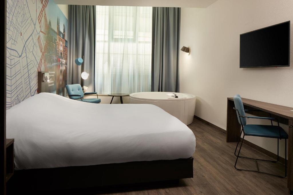 Overnachting in Spa Kamer met privé sauna en bubbelbad in hartje Amsterdam, incl. ontbijtbuffet en Wellness Club